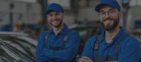 glass shop employees smiling